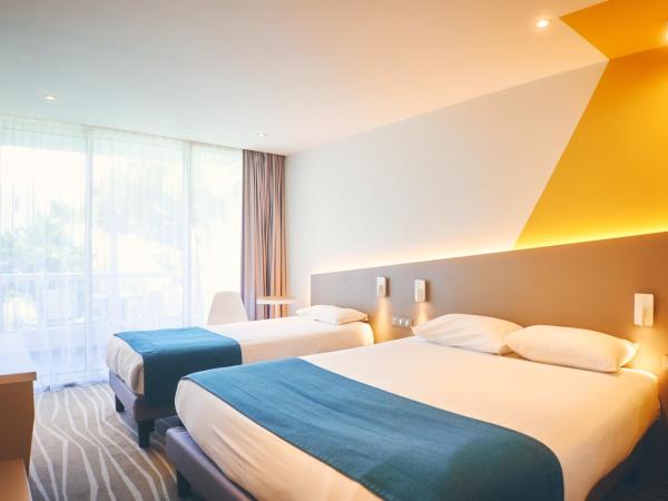 Hotel Le Quetzal : photo 3 de la chambre chambre triple avec balcon