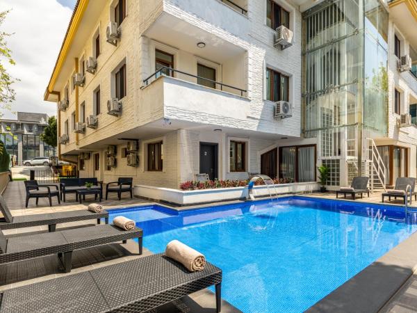 Baymari Suites Design Florya : photo 2 de la chambre appartement 1 chambre de luxe avec accès à la piscine