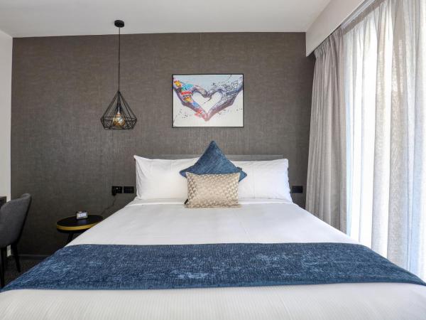 Microtel by Wyndham Wellington : photo 3 de la chambre chambre lit queen-size deluxe 