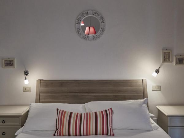 Hotel Spring : photo 2 de la chambre chambre triple avec balcon