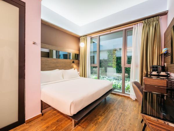 Mercure Singapore Tyrwhitt : photo 2 de la chambre chambre double privilège avec vue sur le jardin
