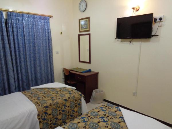 Deira Palace Hotel : photo 3 de la chambre chambre lits jumeaux standard