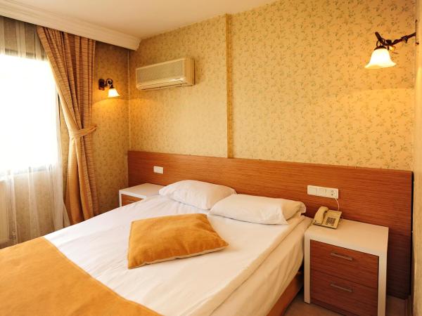 Üstün Hotel Alsancak : photo 1 de la chambre chambre double ou lits jumeaux standard