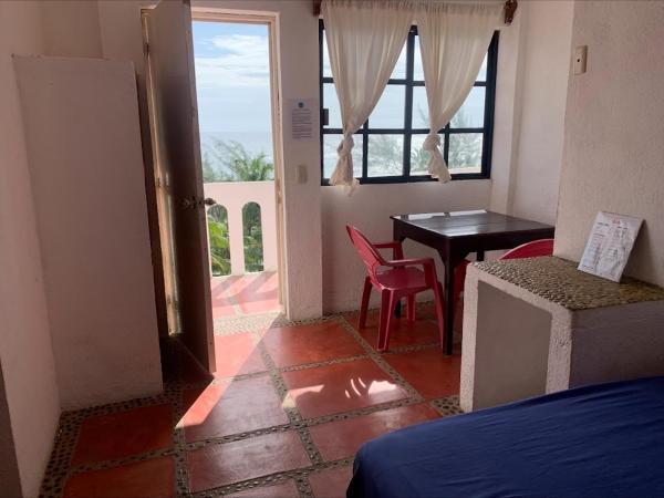La Coral Beach House : photo 4 de la chambre chambre double ou lits jumeaux supérieure