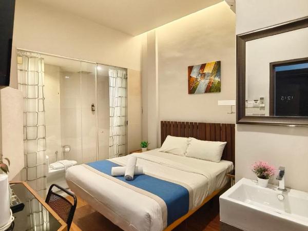 The Riverbank Hotel By MRVJ Business : photo 1 de la chambre chambre standard lit queen-size