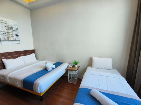 The Riverbank Hotel By MRVJ Business : photo 10 de la chambre suite familiale