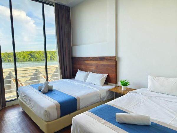 The Riverbank Hotel By MRVJ Business : photo 2 de la chambre suite - vue sur rivière