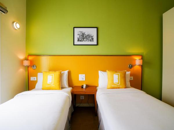 Bloom Boutique l Signature Towers : photo 2 de la chambre chambre lits jumeaux deluxe