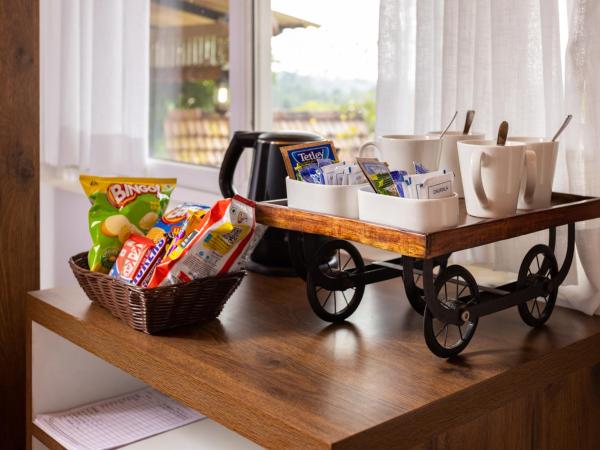 Johns Village : photo 5 de la chambre chambre familiale - vue sur jardin