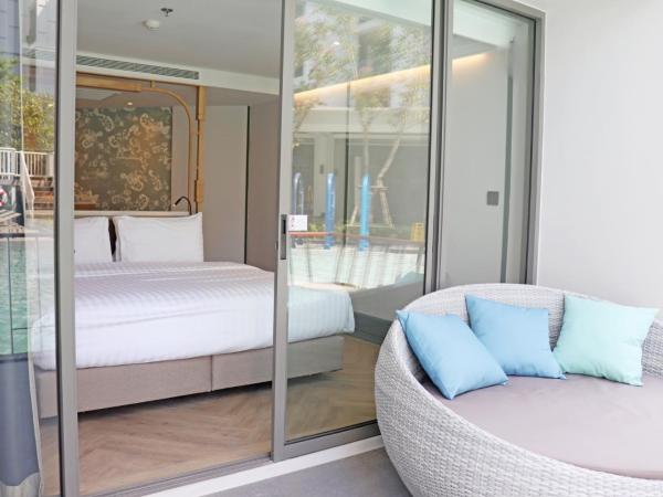 The Quarter Chaophraya by UHG : photo 1 de la chambre suite quarter junior avec lit king-size - accès à la piscine
