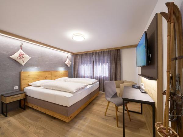 Aparthotel Grischuna : photo 1 de la chambre chambre double