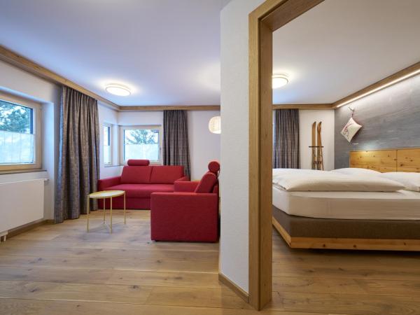 Aparthotel Grischuna : photo 1 de la chambre suite