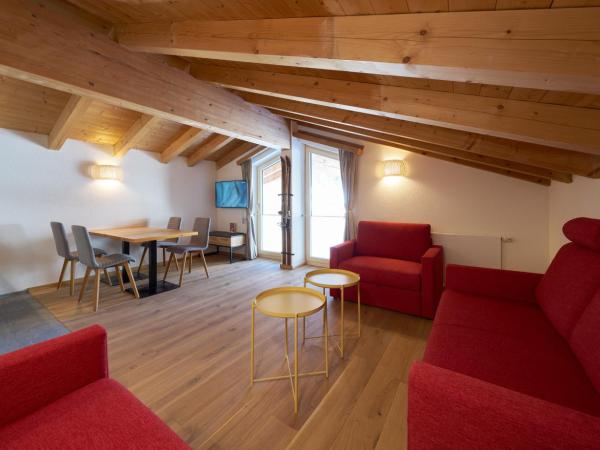 Aparthotel Grischuna : photo 1 de la chambre suite supérieure 