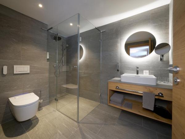 Aparthotel Grischuna : photo 4 de la chambre appartement deluxe