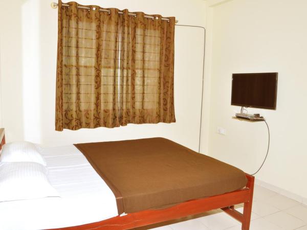 Vega Residency : photo 1 de la chambre chambre double Économique