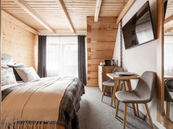 Willa Malinowa : photo 1 de la chambre chambre double deluxe avec balcon