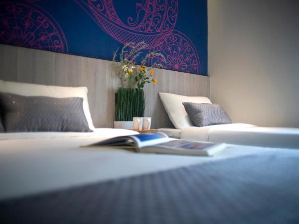 Hotel 81 Premier Princess : photo 3 de la chambre chambre triple