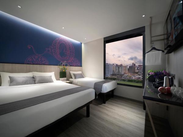 Hotel 81 Premier Princess : photo 1 de la chambre chambre triple