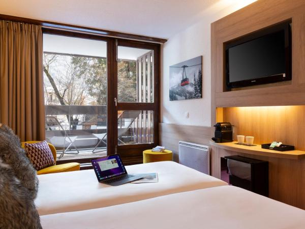 SOWELL HOTELS Mont Blanc et SPA : photo 1 de la chambre chambre lits jumeaux - vue sur montagne