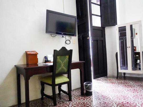 VILLA MERIDA BOUTIQUE HOTEL - Adults Only : photo 3 de la chambre chambre lit queen-size - vue sur jardin