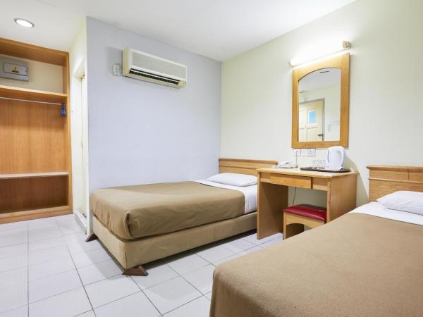 Tang City Hotel at Petaling Street : photo 3 de la chambre chambre lits jumeaux standard