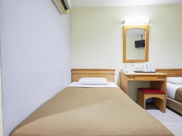 Tang City Hotel at Petaling Street : photo 1 de la chambre chambre lits jumeaux standard