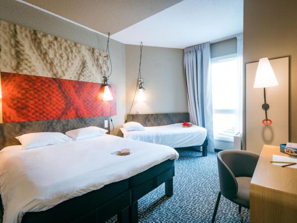 ibis Saint Malo Plage : photo 1 de la chambre chambre standard avec 1 lit double et 1 lit simple