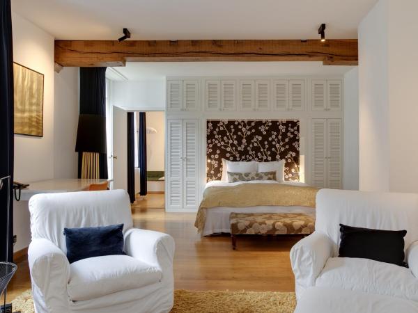 Small Luxury Hotel De Witte Lelie : photo 1 de la chambre chambre lit king-size supérieure