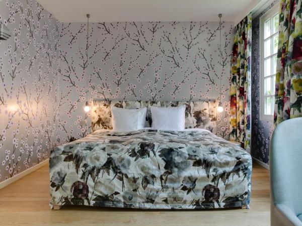 Small Luxury Hotel De Witte Lelie : photo 3 de la chambre suite de luxe