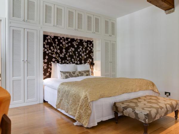 Small Luxury Hotel De Witte Lelie : photo 9 de la chambre chambre lit king-size supérieure