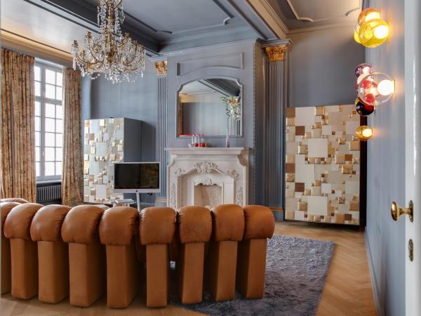 Small Luxury Hotel De Witte Lelie : photo 6 de la chambre suite lit king-size