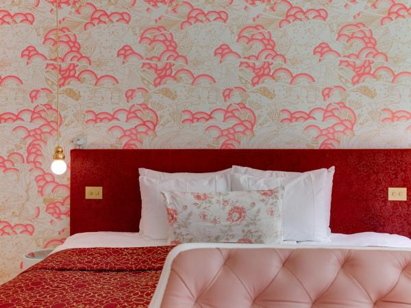 Small Luxury Hotel De Witte Lelie : photo 1 de la chambre chambre lit king-size deluxe
