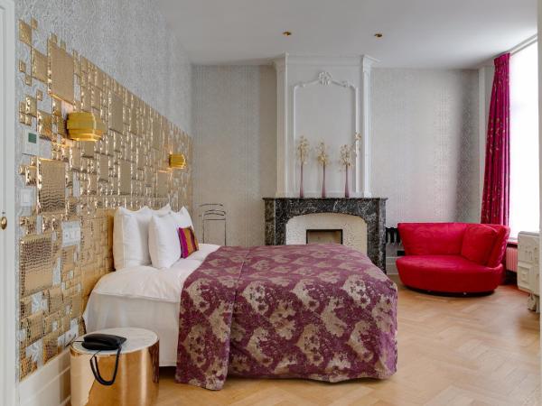 Small Luxury Hotel De Witte Lelie : photo 1 de la chambre suite lit king-size