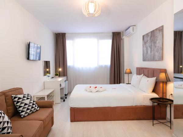 City Plaza Apartments & Rooms : photo 3 de la chambre chambre de rez-de-chaussée