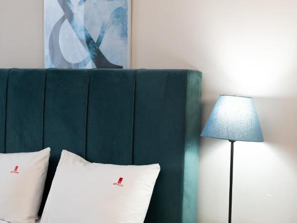 City Plaza Apartments & Rooms : photo 4 de la chambre chambre de luxe avec kitchenette