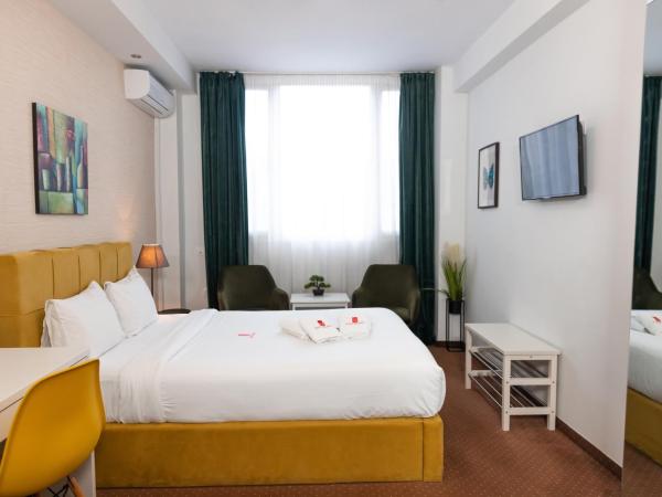 City Plaza Apartments & Rooms : photo 1 de la chambre chambre supérieure