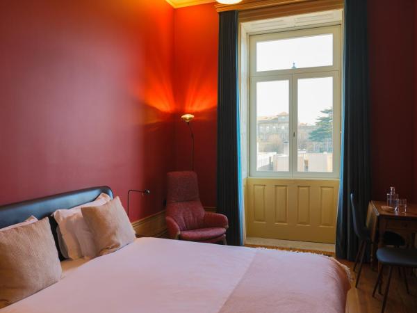 Menina Colina Guesthouse : photo 1 de la chambre chambre double confort