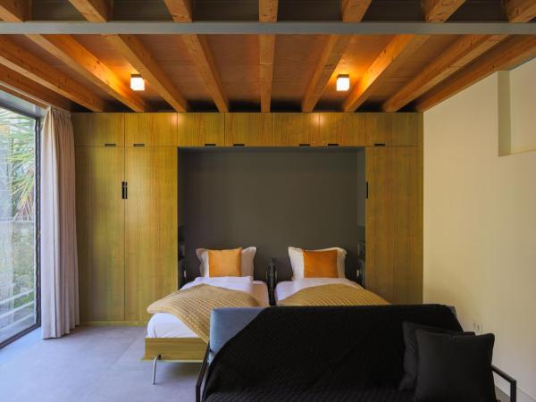 Menina Colina Guesthouse : photo 1 de la chambre maison jardin