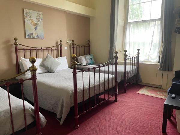 Atlas Guest House : photo 5 de la chambre chambre triple