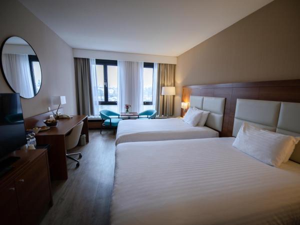 Crowne Plaza Maastricht, an IHG Hotel : photo 1 de la chambre chambre premium avec 2 lits queen-size - vue sur rivière