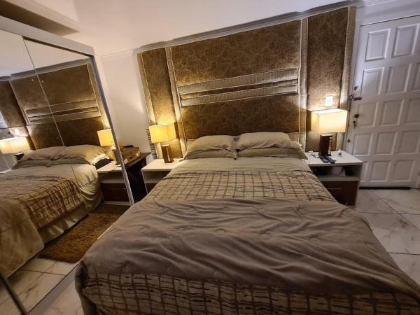 Hostel AJBJ Turismo : photo 2 de la chambre suite lit queen-size