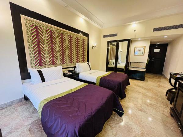 The Lalit Laxmi Vilas Palace : photo 3 de la chambre deluxe twin room with lake view - enjoy 10% discount f&b,spa & laundry