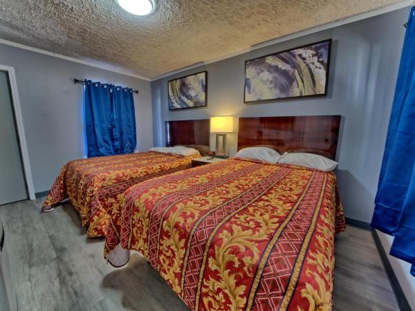 Aqua View Motel : photo 1 de la chambre chambre quadruple standard avec 2 lits doubles - non-fumeurs