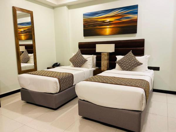 The Somerset Hotel : photo 7 de la chambre deluxe double or twin room (free return airport transfer, 10% off on food & beverage and complimentary gym access)