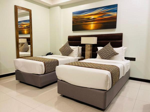 The Somerset Hotel : photo 9 de la chambre deluxe double or twin room (free return airport transfer, 10% off on food & beverage and complimentary gym access)