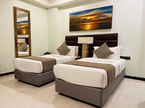 The Somerset Hotel : photo 10 de la chambre deluxe double or twin room (free return airport transfer, 10% off on food & beverage and complimentary gym access)