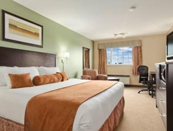 Super 8 by Wyndham Saskatoon Near Saskatoon Airport : photo 2 de la chambre chambre lit queen-size pour personnes à mobilité réduite - non-fumeurs 