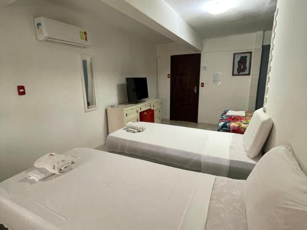 Pousada Beijos y Abraços : photo 1 de la chambre chambre quadruple standard