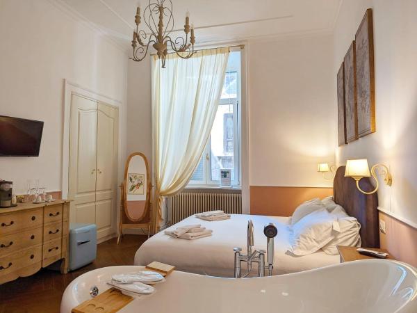 Macchiato Suites Boutique Guest House : photo 6 de la chambre chambre double deluxe avec baignoire