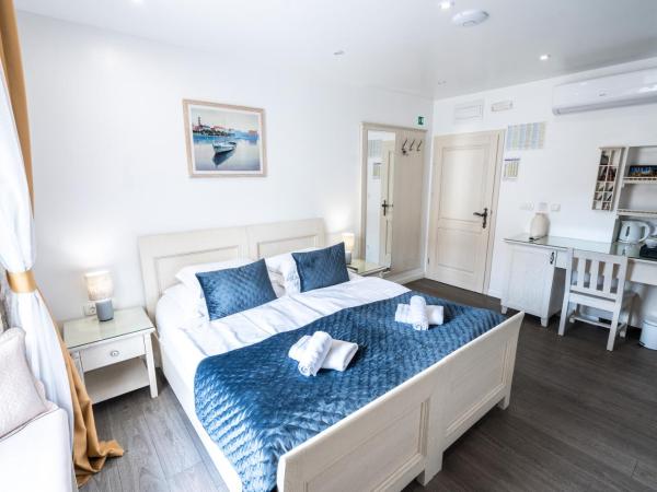 Luxury Rooms Lucija and Luka : photo 2 de la chambre chambre double ou lits jumeaux supérieure - vue sur vieille ville - narodni trg 9